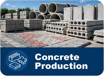 Stacks of concrete blocks and large round pipes in an outdoor yard, with a blue banner that reads ‘Concrete Production’.